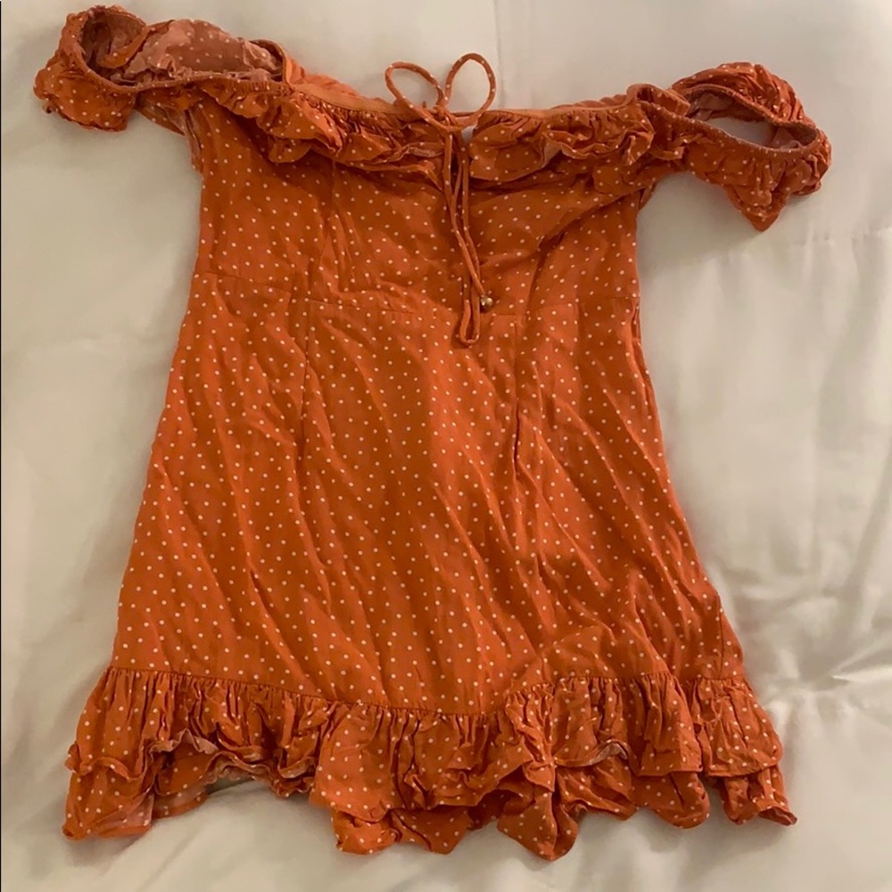 Orange and white polka dot sundress